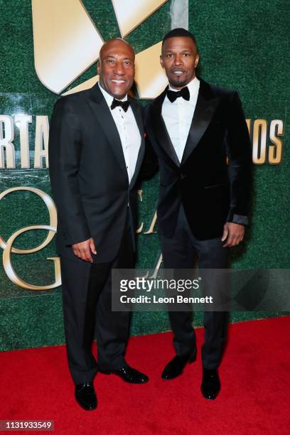 Jamie Foxx and Byron Allen attend an Oscar viewing and after party hosted by Byron Allen at the Beverly Wilshire Four Seasons Hotel on February 24,...
