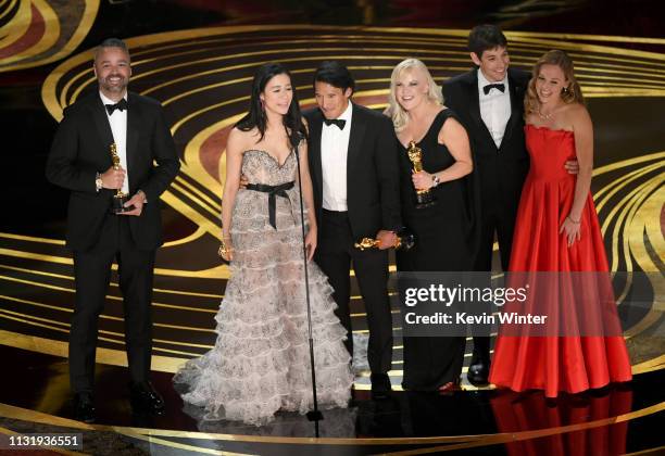 Evan Hayes, Elizabeth Chai Vasarhelyi, Jimmy Chin, Shannon Dill, Alex Honnold and Sanni McCandless accept the Documentary award for 'Free Solo'...