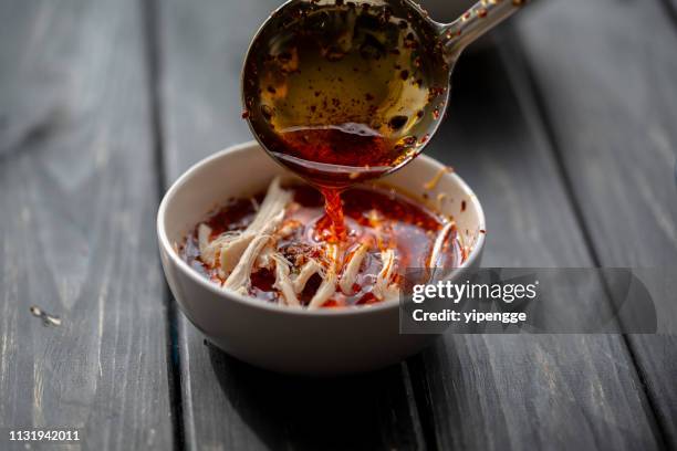spicy shredded chicken meat gravy - chili oil stock pictures, royalty-free photos & images