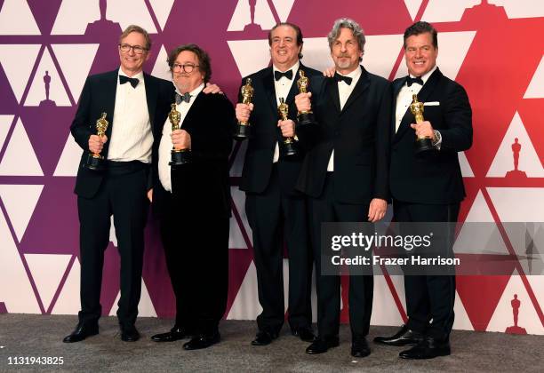 Jim Burke, Charles B. Wessler, Nick Vallelonga, Peter Farrelly, and Brian Currie, winners of Best Picture for "Green Book," pose in the press room...