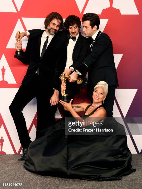 Andrew Wyatt, Anthony Rossomando, Mark Ronson, and Lady Gaga, winners of Best Original Song for "Shallow" from "A Star is Born," pose in the press...