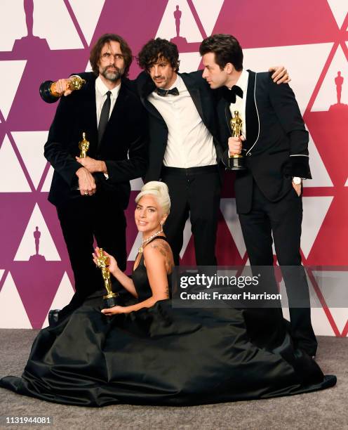 Andrew Wyatt, Anthony Rossomando, Mark Ronson, and Lady Gaga, winners of Best Original Song for "Shallow" from "A Star is Born," pose in the press...