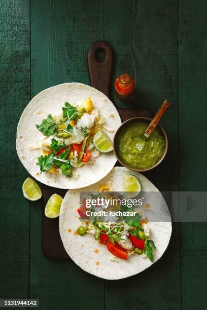 tacos loaded with fish fillets - codfish imagens e fotografias de stock