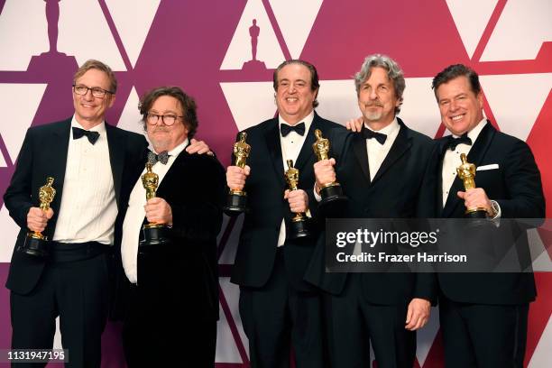 Jim Burke, Charles B. Wessler, Nick Vallelonga, Peter Farrelly, and Brian Currie, winners of Best Picture for "Green Book," pose in the press room...