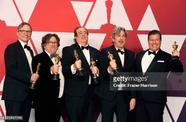 Jim Burke, Charles B. Wessler, Nick Vallelonga, Peter Farrelly, and Brian Currie, winners of Best Picture for "Green Book," pose in the press room...