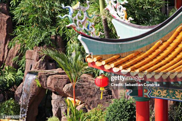 an oasis of relaxation and religious culture in the heart of the malaysian capital,kuala-lumpur, malaysia - thean hou stock pictures, royalty-free photos & images