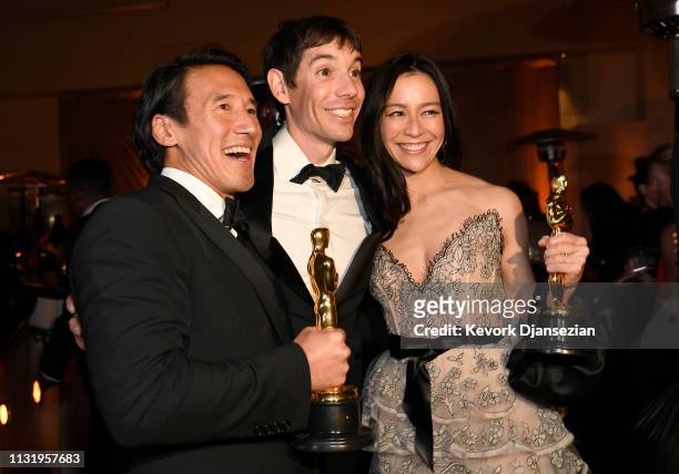 Jimmy Chin, Alex Honnold, and Elizabeth Chai Vasarhelyi, winners of the Documentary award for 'Free Solo,' attend the 91st Annual Academy Awards...
