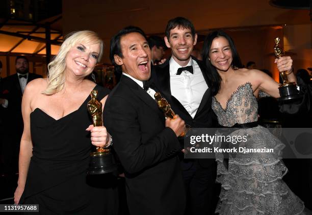 Shannon Dill, Jimmy Chin, Alex Honnold, and Elizabeth Chai Vasarhelyi, winners of the Documentary award for 'Free Solo,' attend the 91st Annual...