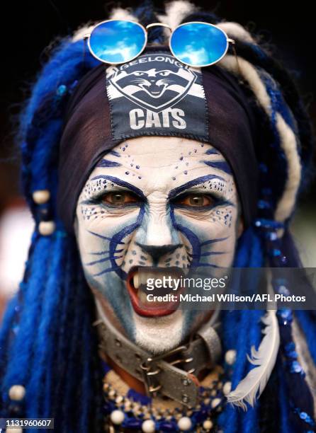 Cats fan poses for a photograph during the 2019 AFL round 01 match between the Collingwood Magpies and the Geelong Cats at the Melbourne Cricket...