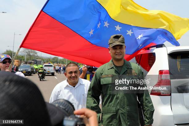 Venezuelan soldier left the unit and exile is welcomed by Venezuelan people at the Simon Bolivar international bridge on February 23, 2019 in Cucuta,...
