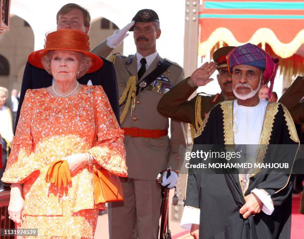 Oman's Sultan Qaboos bin Said welcomes Queen Beatrix of the Netherlands upon her arrival in Muscat on January 10, 2012 for an official visit. AFP...