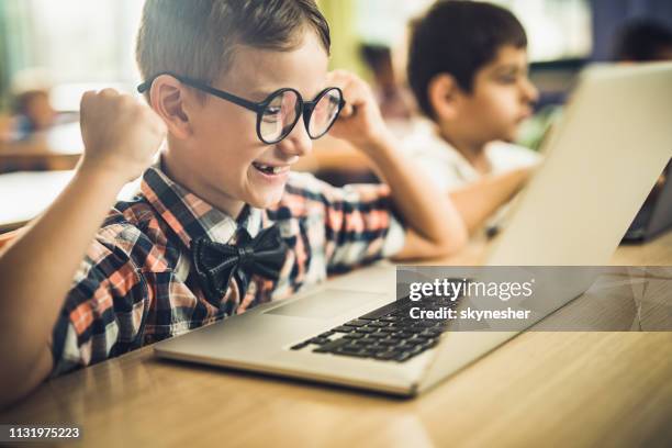 2,176 Kid Celebrating At Computer Stock Photos, High-Res Pictures, and ...