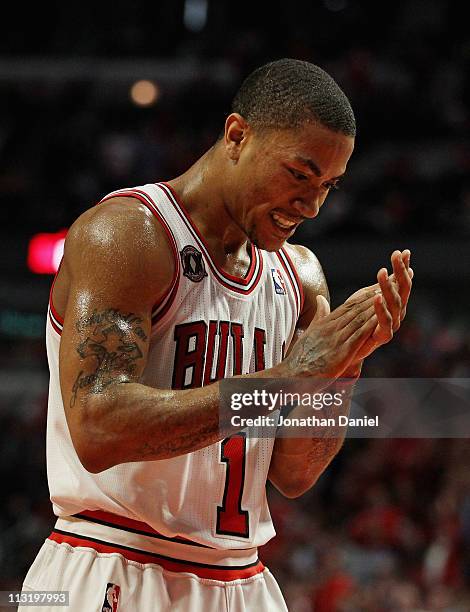 Derrick Rose of the Chicago Bulls claps while celebrating a play against the Indiana Pacers in Game Five of the Eastern Conference Quarterfinals in...