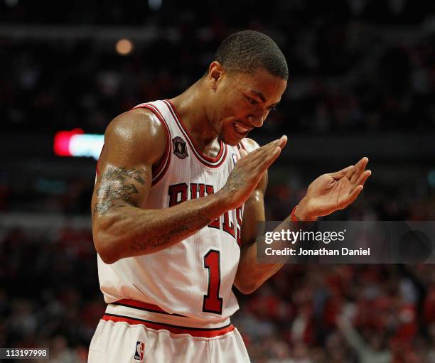 Derrick Rose of the Chicago Bulls claps while celebrating a play against the Indiana Pacers in Game Five of the Eastern Conference Quarterfinals in...