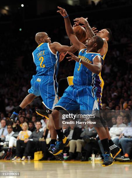 Matt Barnes of the Los Angeles Lakers goes up for a rebound between Jarrett Jack and Chris Paul of the New Orleans Hornets in the first half in Game...