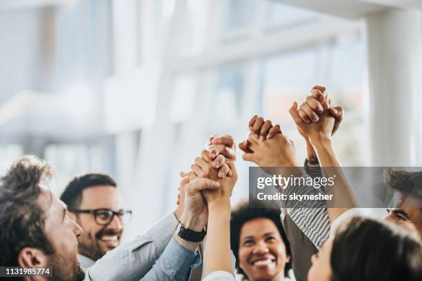 sea of hands in unity! - trust stock pictures, royalty-free photos & images