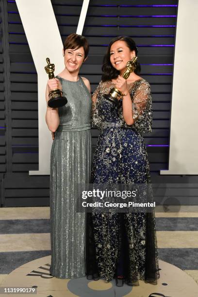 Becky Neiman-Cobb and Domee Shi attend the 2019 Vanity Fair Oscar Party hosted by Radhika Jones at Wallis Annenberg Center for the Performing Arts on...