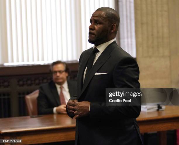 Singer R. Kelly appears in court for a hearing to request that he be allowed to travel to Dubai at the Leighton Criminal Court Building on March 22,...