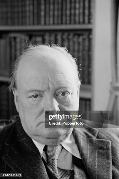 British politician Winston Churchill pictured in the library of Chartwell country house near Westerham in Kent, England in October 1939. Winston...