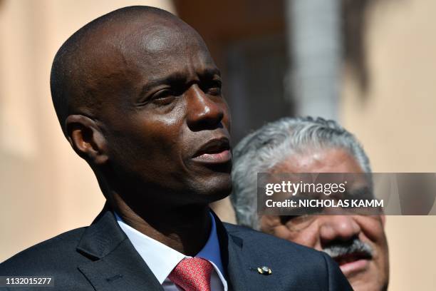 Haitain President Jovenel Moïse speaks to the press after meeting US President Donald Trump during an event with Caribbean leaders hosted by Trump at...