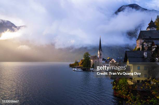 beautiful hallstatt village of austria. hallstatt is a charming lakeside village in the alps - gmunden austria stock pictures, royalty-free photos & images