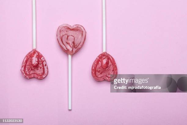 three love lollipops - niñez stockfoto's en -beelden