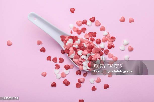 spoon full of hearts - niñez stockfoto's en -beelden