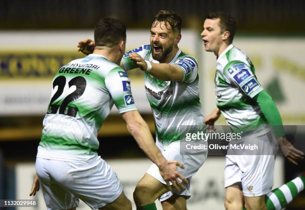 Ballybofey , Ireland - 22 March 2019; Greg Bolger, centre, of Shamrock Rovers celebrates with team-mate Aaron Greene after scoring his side's first...
