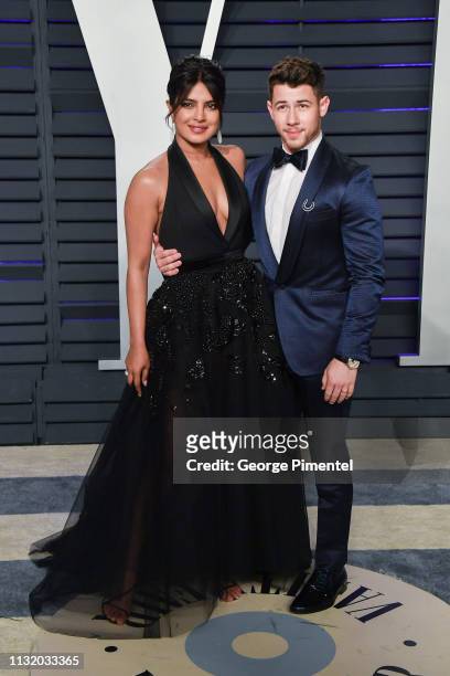 Priyanka Chopra and Nick Jonas attend the 2019 Vanity Fair Oscar Party hosted by Radhika Jones at Wallis Annenberg Center for the Performing Arts on...