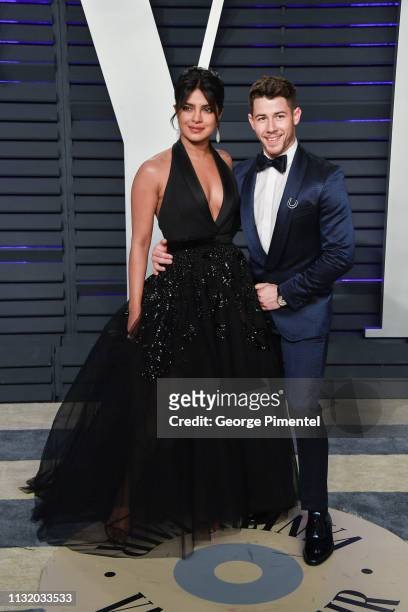 Priyanka Chopra and Nick Jonas attend the 2019 Vanity Fair Oscar Party hosted by Radhika Jones at Wallis Annenberg Center for the Performing Arts on...