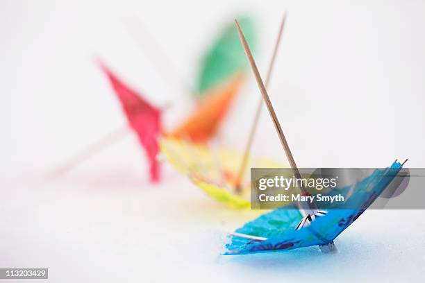 cocktail umbrellas - paper umbrella stock pictures, royalty-free photos & images