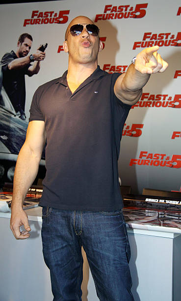 Actor Vin Diesel signs posters of their lastest film 'Fast & Furious 5' at El Corte Ingles store Castellana street on April 26, 2011 in Madrid, Spain.