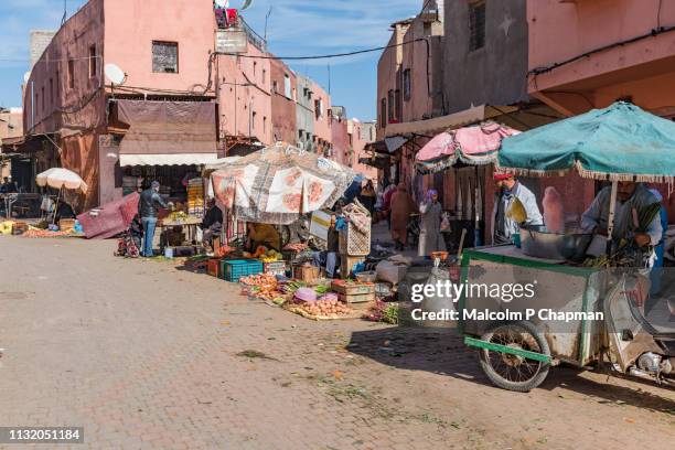 fruit and vegetable market, bab el khmiss district, marrakesh morocco - marrakesh stock pictures, royalty-free photos & images