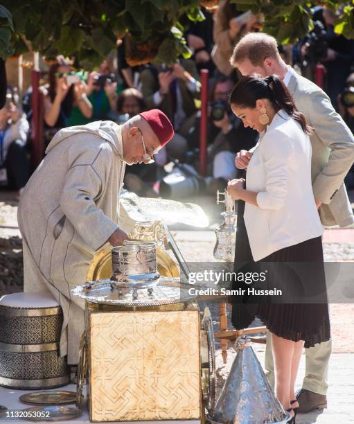 Prince Harry, Duke of Sussex and Meghan, Duchess of Sussex visit the Andalusian Gardens to hear about youth empowerment in Morocco from a number of...