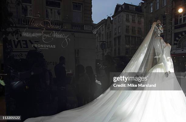 Wedding dress is displayed in the window of Pronovias boutique during the launch of a collection inspired by Catherine Middleton on April 27, 2011 in...