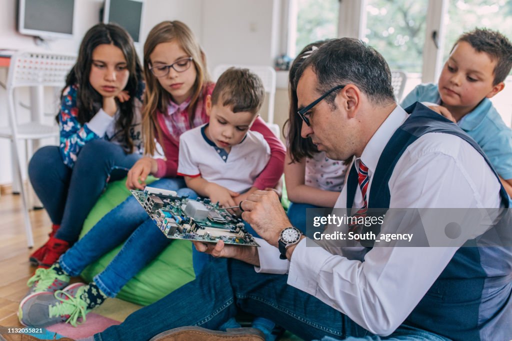 Kids Using Hardware Children Learning About Computer Hardware High-Res Stock Photo - Getty ...