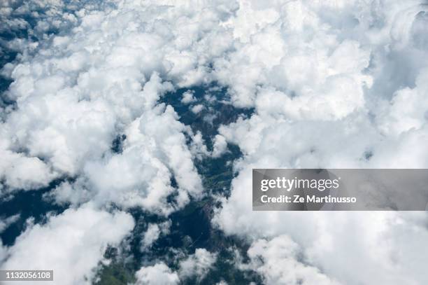 clouds - condições meteorológicas stock-fotos und bilder