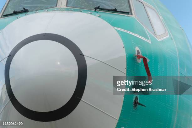 One of two sensors that measures the angle of attack is pictured at bottom on a Boeing 737 MAX 8 airplane outside the company's factory on March 22,...