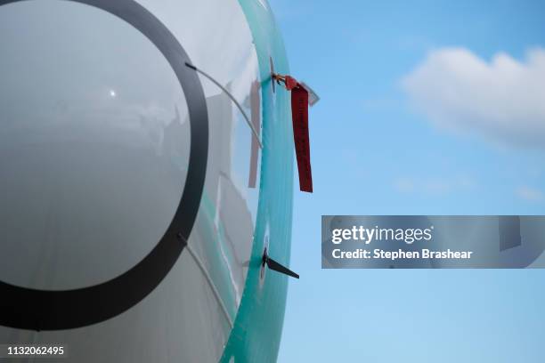 One of two sensors that measures the angle of attack is pictured at bottom on a Boeing 737 MAX 8 airplane outside the company's factory on March 22,...