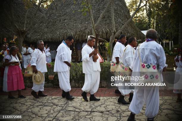 Mexican Totonac natives perform a ceremony to request permission from the gods, to hold the Tajin Summit Festival -aimed at preserving the Totonac...