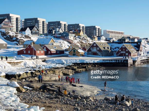 View over the old town and the colonial harbour towards the modern quarters of Nuuk. Nuuk. The capital of Greenland. America. North America....