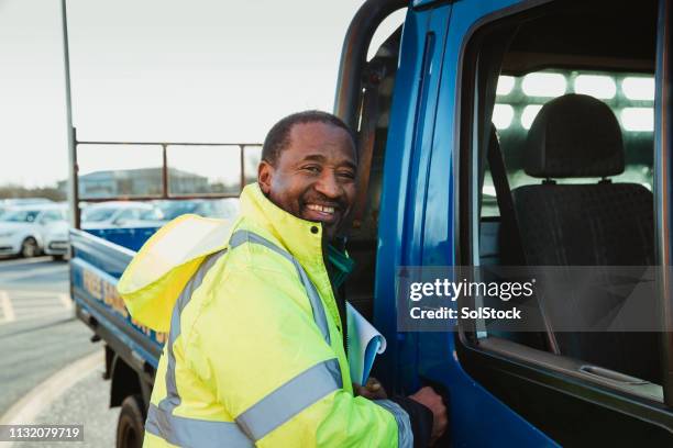manual worker ready to start the day - van driver uk stock pictures, royalty-free photos & images