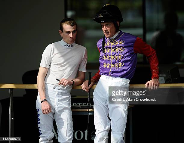 Jockeys Ryan Moore and Richard Hughes at Ascot racecourse on April 27, 2011 in Ascot, England.