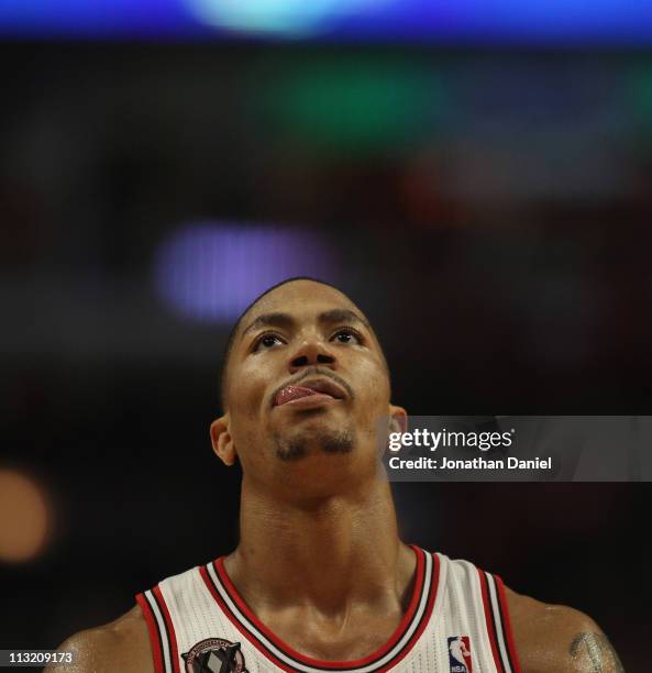 Derrick Rose of the Chicago Bulls heads back down the court after hitting a three-point shot against the Indiana Pacers in Game Five of the Eastern...