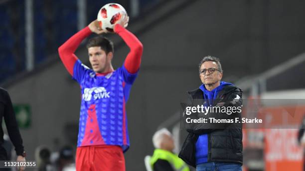 Head coach Norbert Meier of Uerdingen looks on as Christian Dorda of Uerdingen throws in the ball during the 3. Liga match between KFC Uerdingen 05...