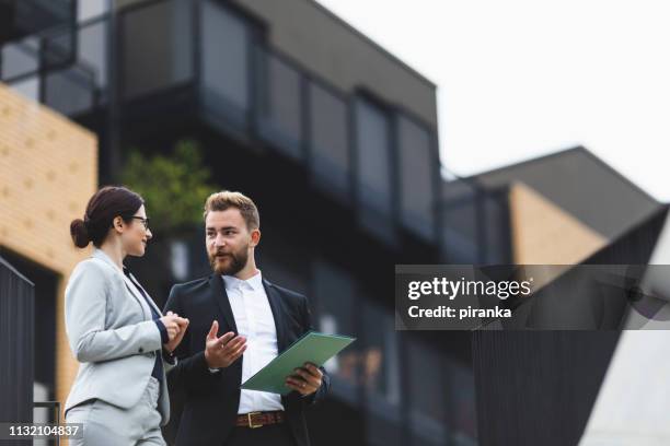 real estate agent on a meeting - real estate agent imagens e fotografias de stock