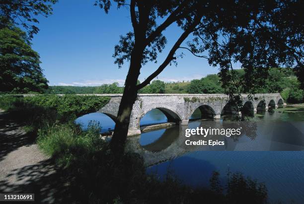 An eight-arched stone bridge near Tenby, Pembrokeshire, Wales, June 1997.