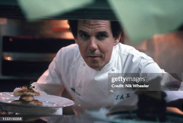 Master Chef Thomas Keller cooks in kitchen of his restaurant in hotel in Los Angeles circa 1996.