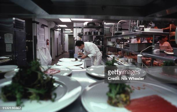 Master Chef Thomas Keller cooks in kitchen of his restaurant in hotel in Los Angeles circa 1996.