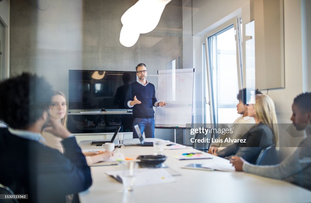 Group of people during a presentation in modern office